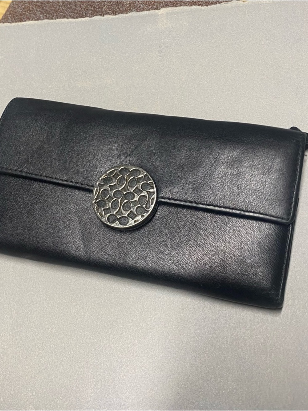 Coach Black Leather Wallet with Silver Medallion